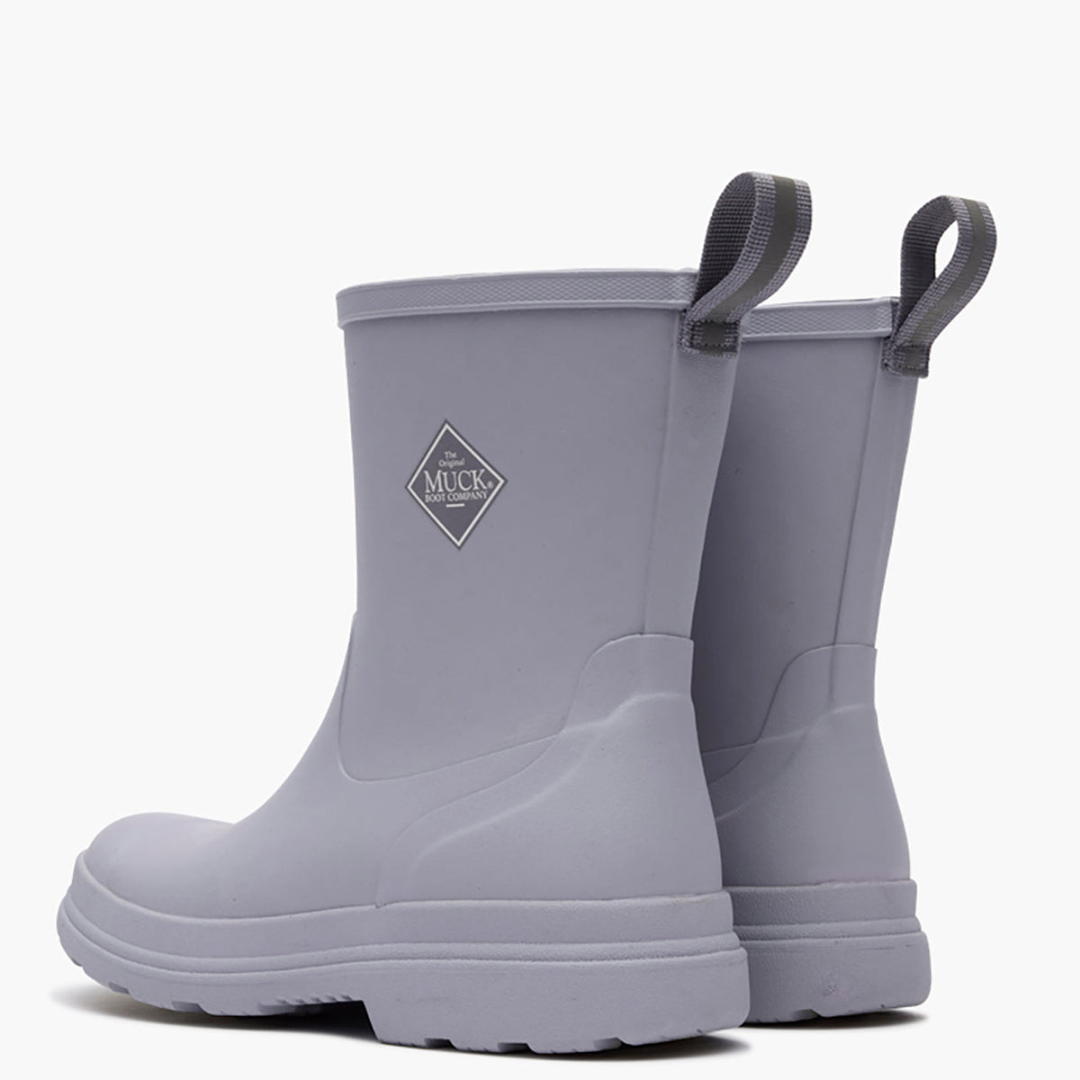 Pair of gray rain boots with a visible brand logo on a white background