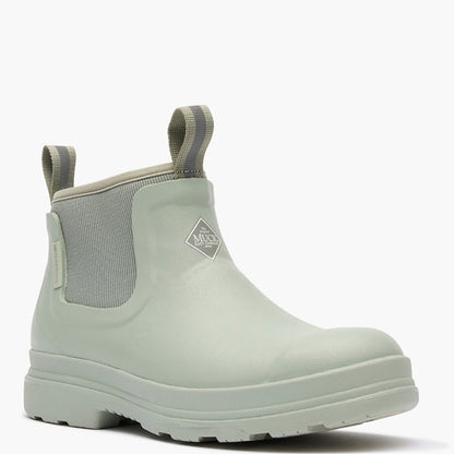 Light green rubber boot with a brand logo on a white background