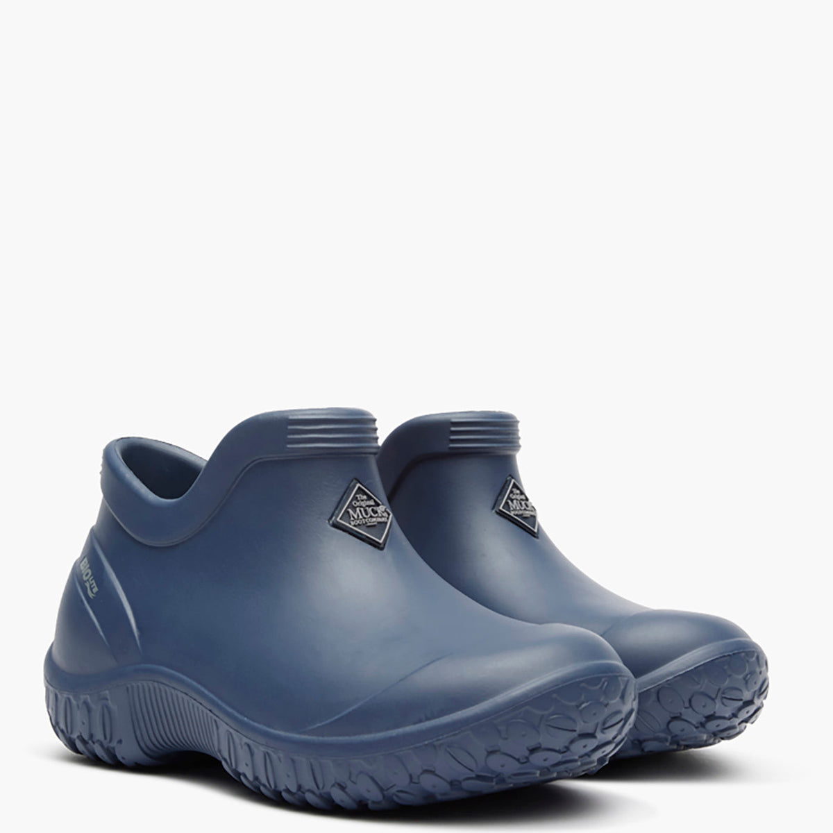 Pair of blue rubber shoes on a white background
