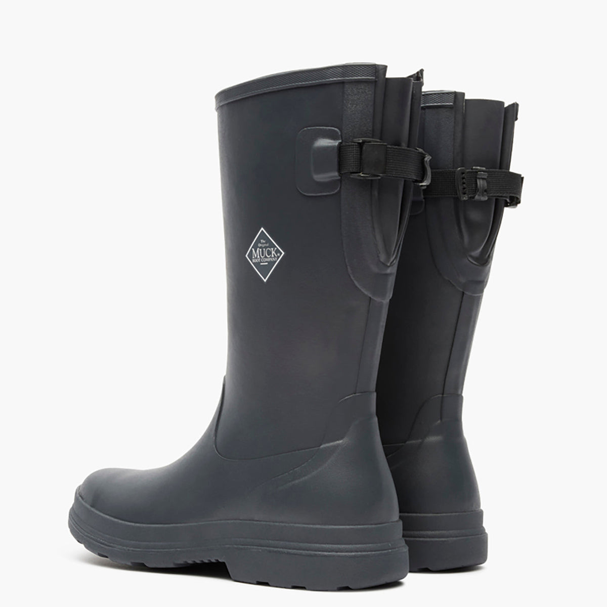 Pair of black rubber boots with a buckle on a white background